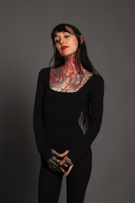 Classic Apparel: Form Fitting Jumpsuit With Thumbholes