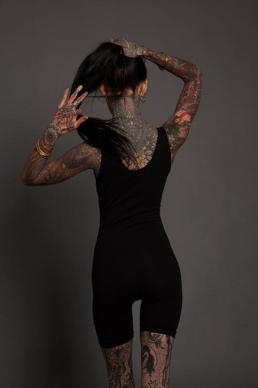 Classic Apparel: Form Fitting Playsuit
