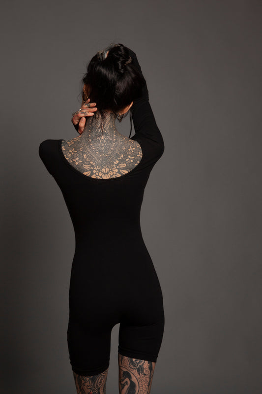 Classic Apparel: Form Fitting Playsuit With Thumbholes