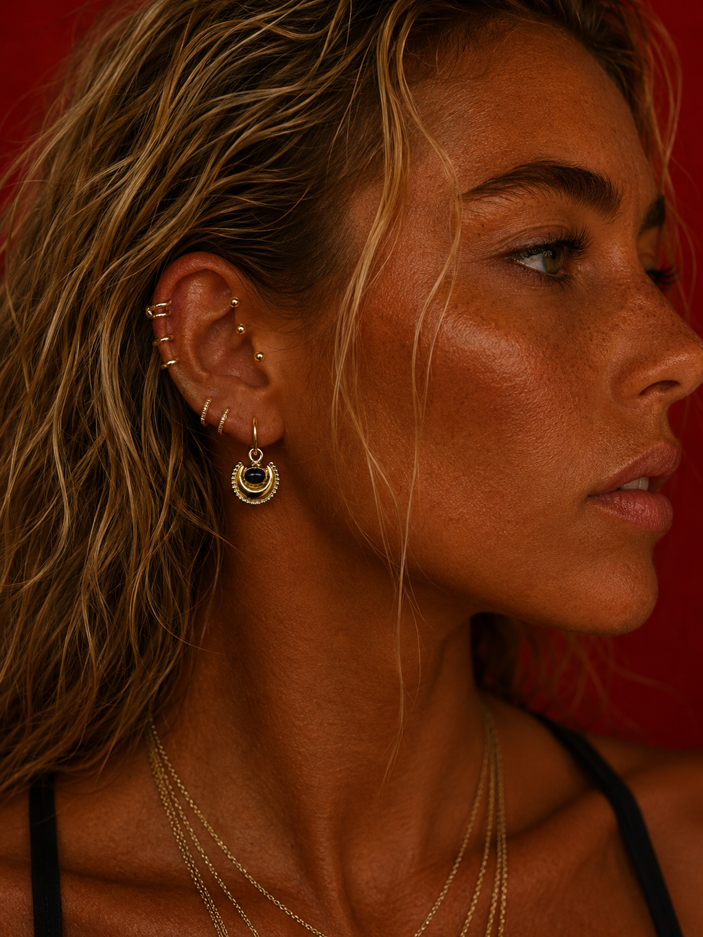 Sun Serpent Brass Earrings with Onyx