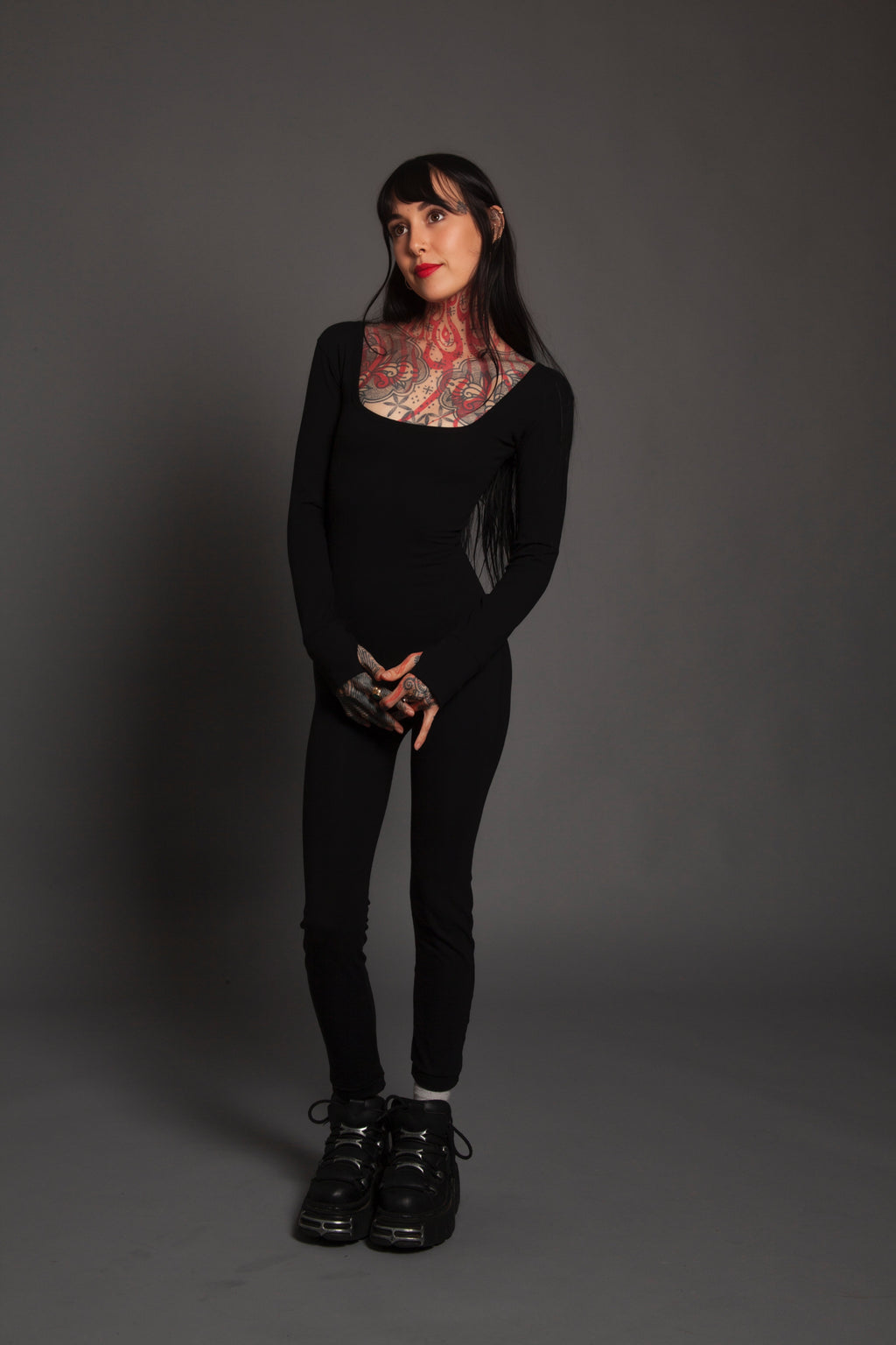 Form Fitting Jumpsuit With Thumbholes