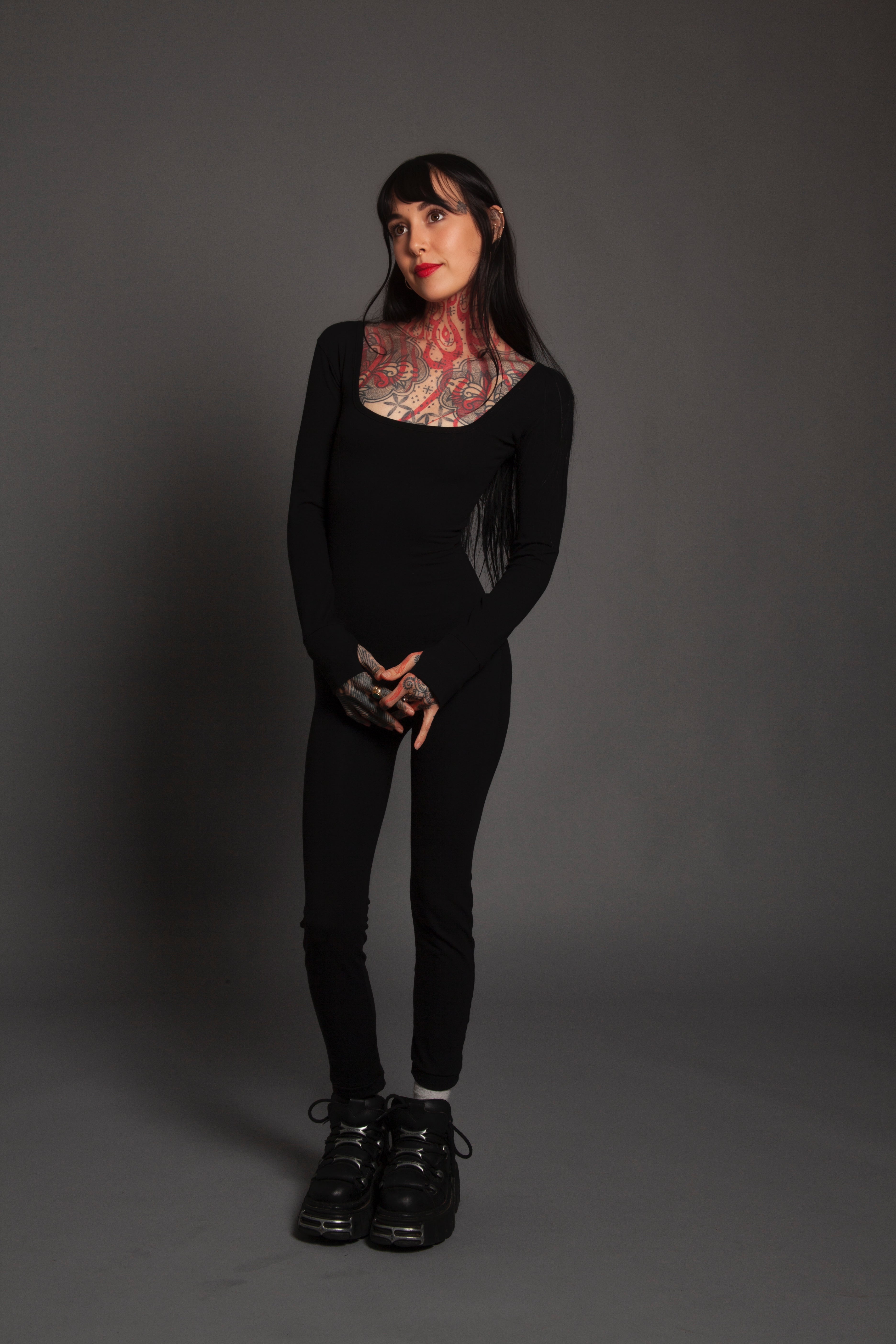 Form Fitting Jumpsuit With Thumbholes
