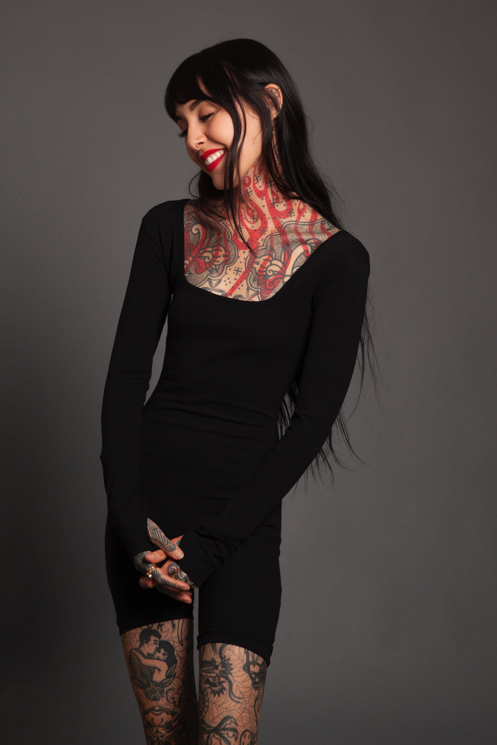 Form Fitting Playsuit With Thumbholes
