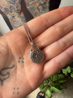 Sundial Pendant with Garnet
