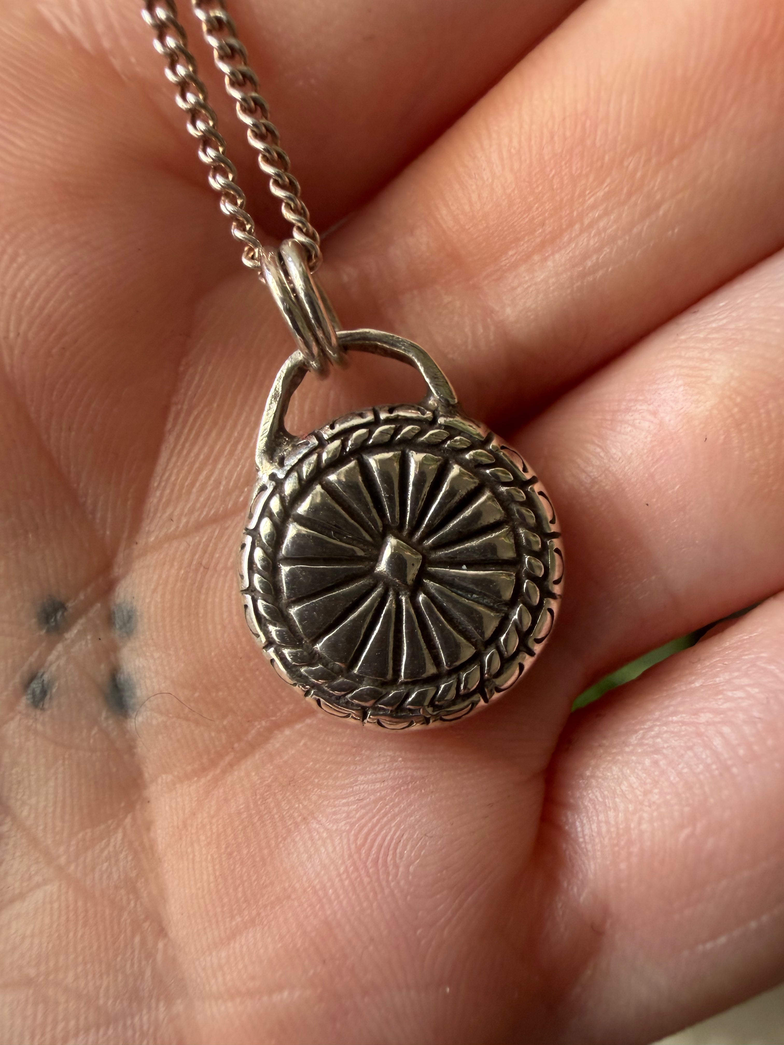 Sundial Pendant with Garnet