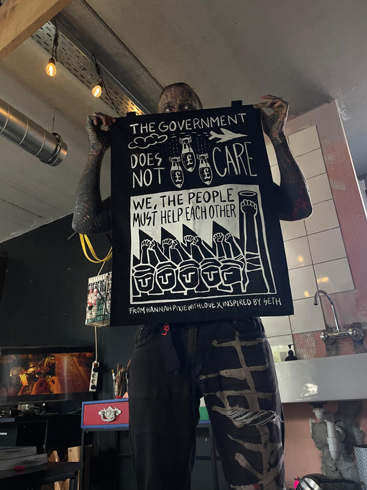 "Community As Resistance" Protest Flag