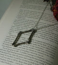 Bone Collector Pendant